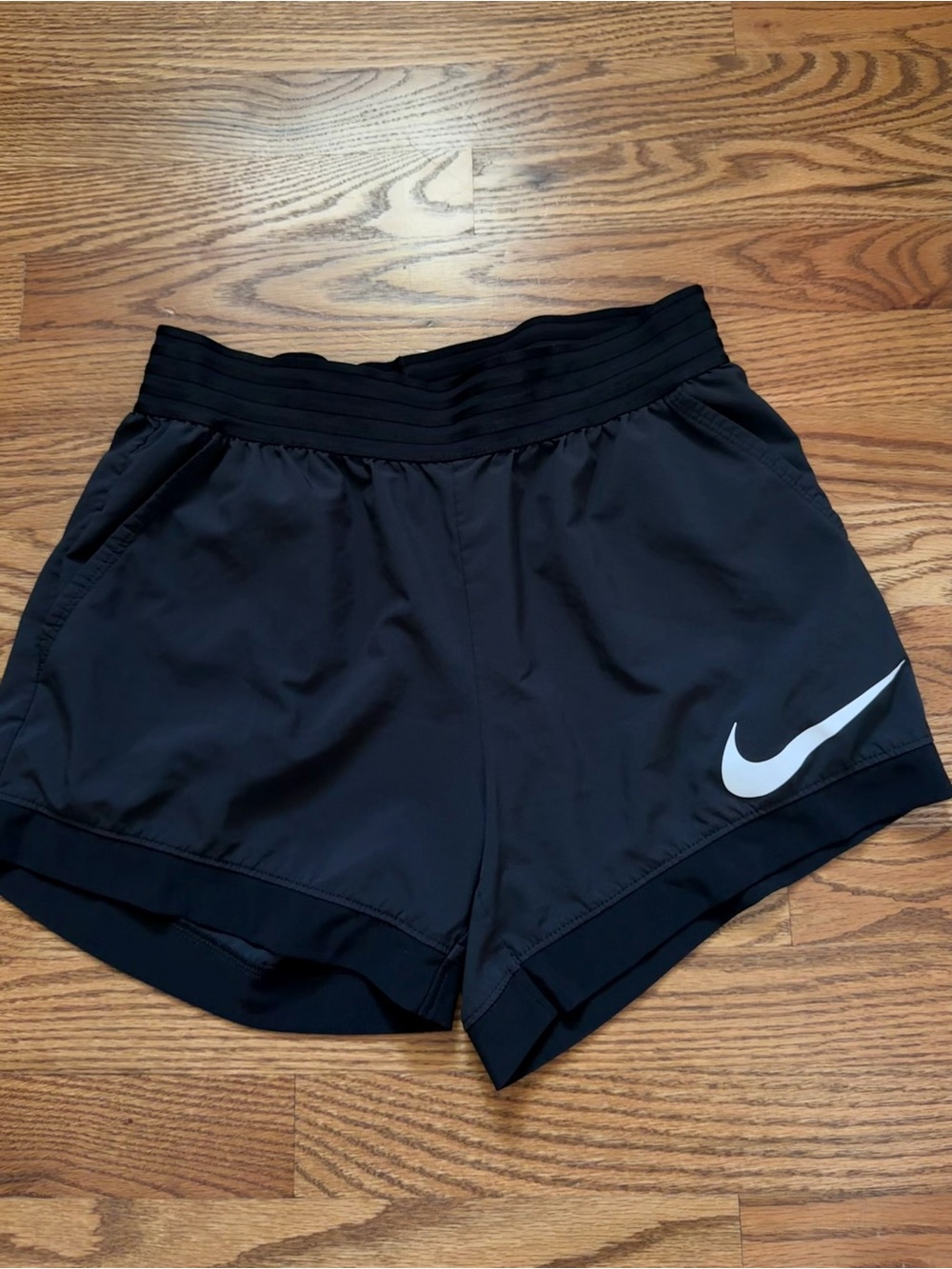 Nike Women's Black Athletic Shorts with White Swoosh size S